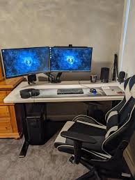 Ergonomic wireless mouse on a clean desk setup